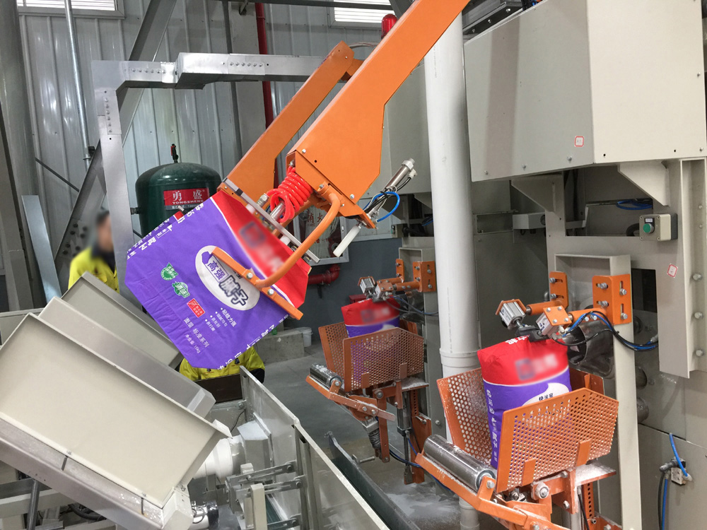 全(quan)自動閥(fá)口上袋(dai)機 自動(dong)上袋機(ji) 全自動(dong)包裝機(jī) 第1張